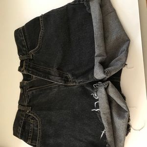 Distressed black jean shorts